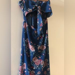 Floral midi dress with cutout pattern at waistline